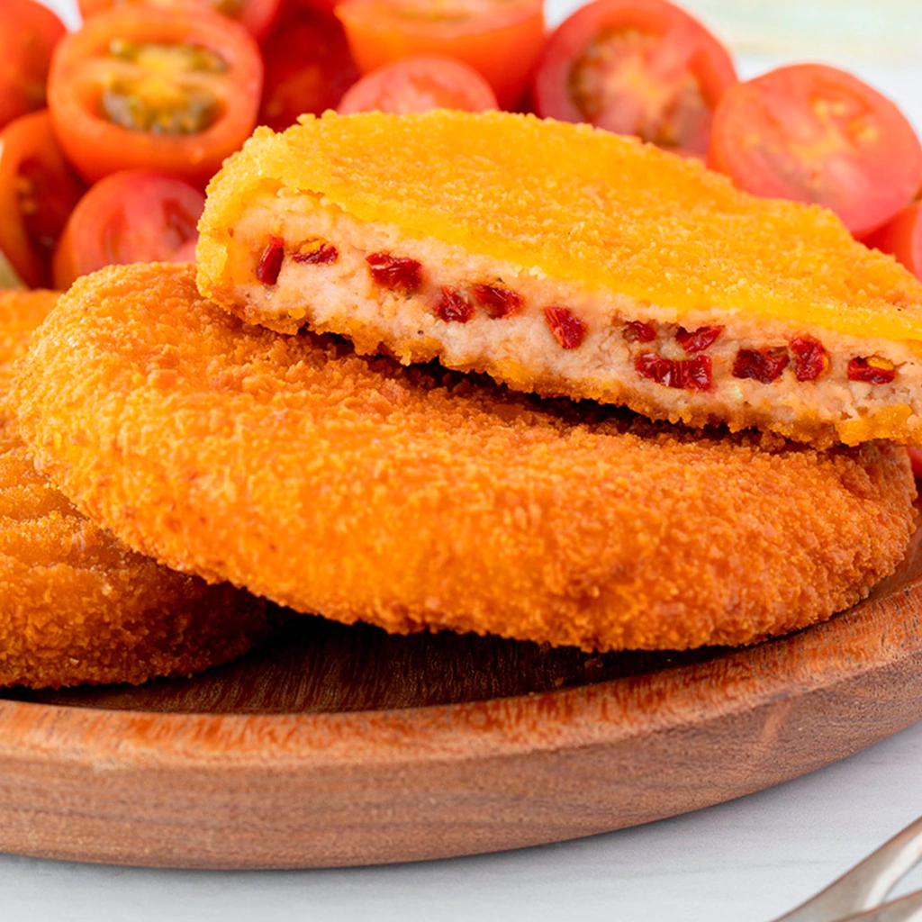 Medallón de merluza con tomate